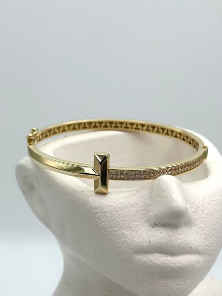Жіночий золотий браслет оздоблений фіанітами 585 проби 0024 фото